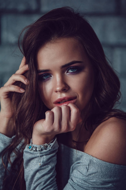 Portrait of a sexy woman with makeup and beautiful hair. - Fotografie, Obrázek