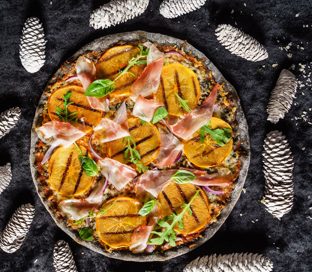 Christmas pizza with persimmon, close up - Fotografie, Obrázek