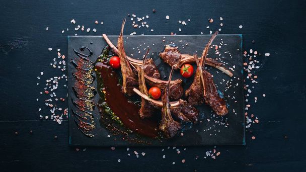 Baked Rib Grilled. Mutton. Carry a lamb. Tagliateli Italian cuisine. Free space for your text. Top view. - 写真・画像