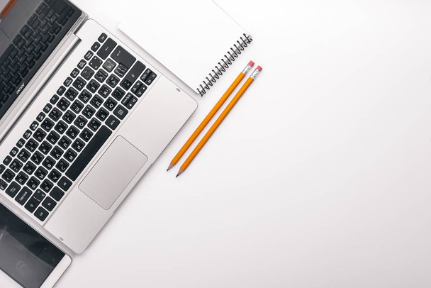 Graphic designer. Laptop, notebook, pencil. Top view. On a white background. Free space for text. - Foto, Imagem