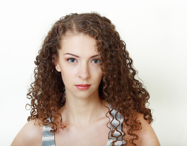 Young woman with curly hair - Fotografie, Obrázek