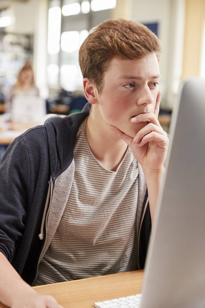Male Student Working On Computer  - Fotó, kép