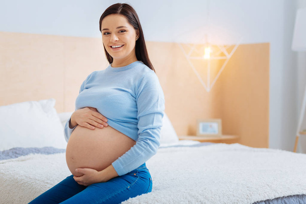 Pretty female person waiting for baby - Photo, image