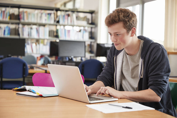 Male Student Working At Laptop  - Foto, Imagem