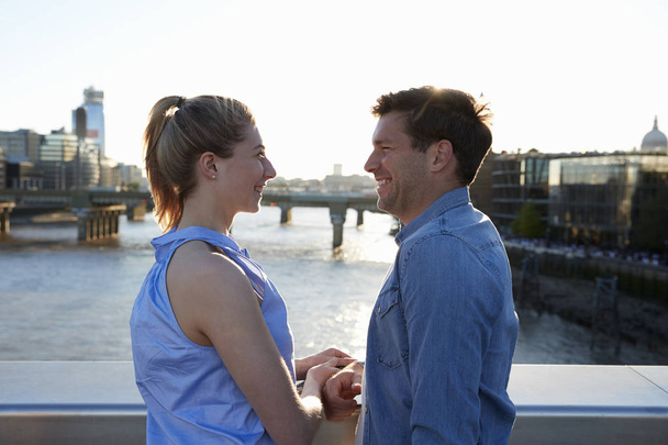 Romantic couple on bridge - Zdjęcie, obraz
