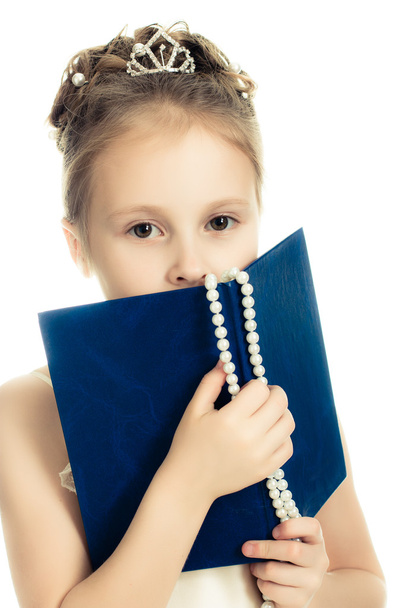 Pretty beautiful girl with a prayer book. - Fotoğraf, Görsel