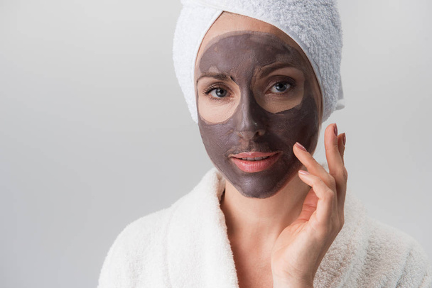 Pleasant adult woman is enjoying skin care treatment - Valokuva, kuva