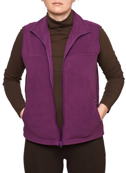 Young woman wearing purple fleece vest isolated on white background - Photo, Image