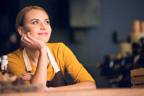 Thoughtful girl dreaming at work in cafe - Фото, изображение