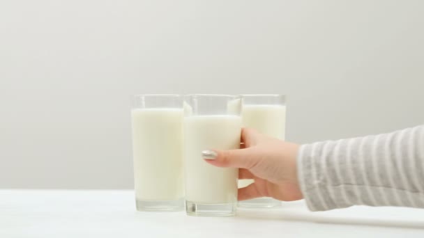 healthy milk drink three glasses family dairy - Footage, Video