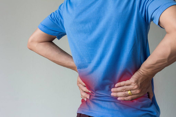 asian man have back pain with copy space - 写真・画像