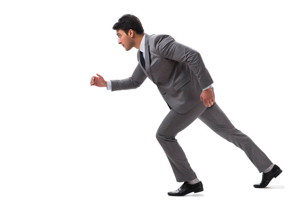 Young businessman running forward isolated on white - Foto, Imagen
