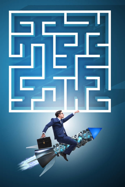 Uncertainty concept with businessman lost in maze labyrinth - Photo, Image