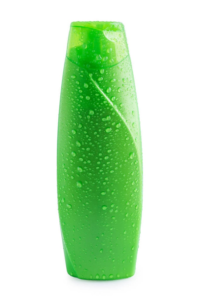 green plastic bottle shampoo with water drop on white - Photo, Image