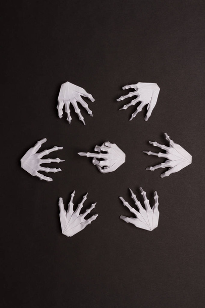 Black Halloween Background with White Skeleton Hands - Φωτογραφία, εικόνα