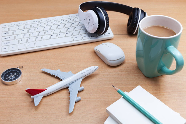 business objects on office desk with airplane model - Photo, Image