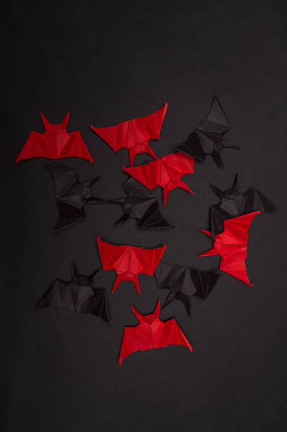 Halloween Background. Black background. Red and black bats - Фото, зображення