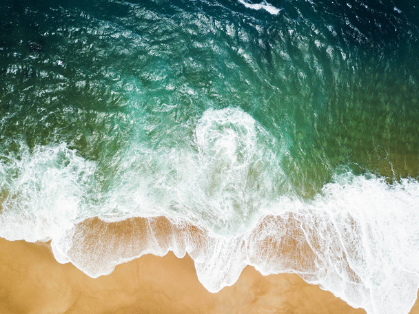 Top view of a deserted beach. The Portuguese coast of the Atlant - Photo, Image