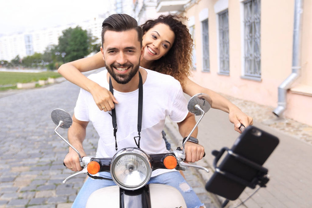 Happy couple traveling on motorcycle.Travel concept - Φωτογραφία, εικόνα