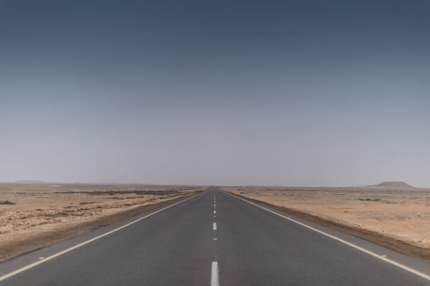 Road without cars in the Namibe Desert. Angola. - Photo, Image
