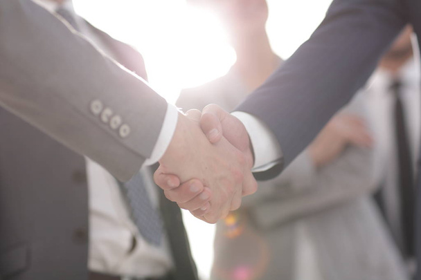 background image of handshake of business people . - Foto, Bild