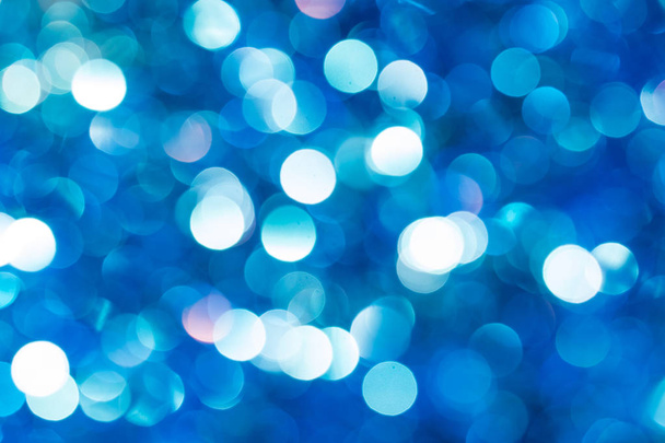 Christmas and New Year blue blurred defocused bokeh background - Foto, Imagen