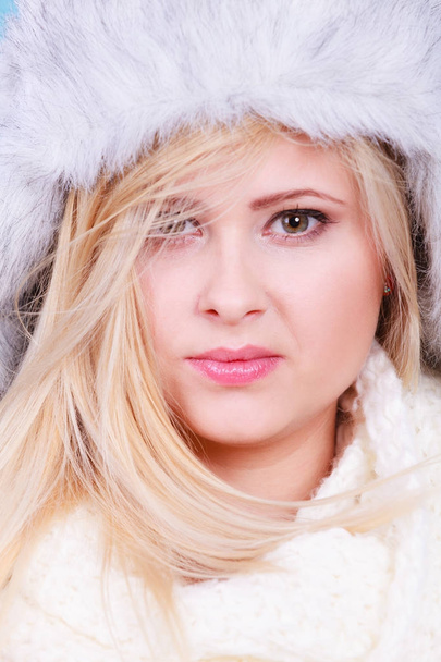Blonde woman in winter warm furry hat - Foto, Imagem
