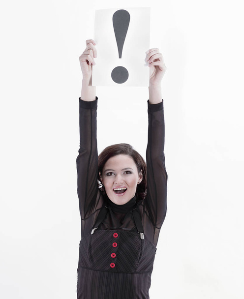 young business woman holding a sheet with exclamation mark. - Foto, Imagen