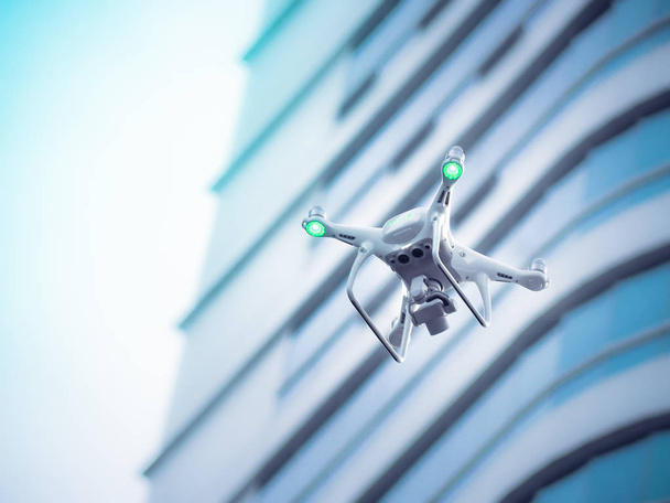 Drone με ψηφιακή φωτογραφική μηχανή υψηλής ανάλυσης, που φέρουν στην πόλη. - Φωτογραφία, εικόνα