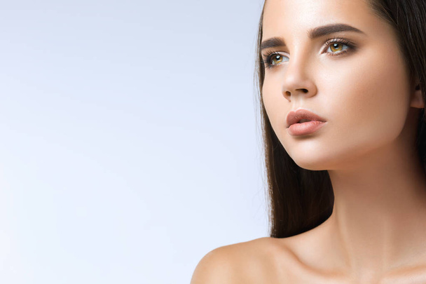 The beautiful face of young woman with cleanf fresh skin - Valokuva, kuva