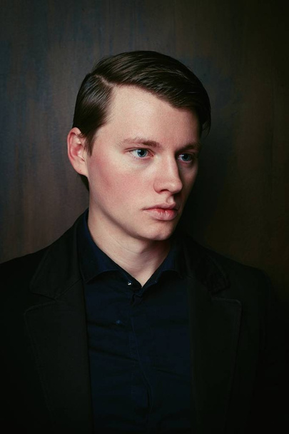 studio shot of handsome young man posing  - Fotografie, Obrázek