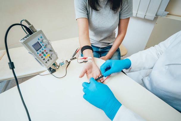 Patient nerves testing using electromyography. Medical examination. EMG - Фото, изображение