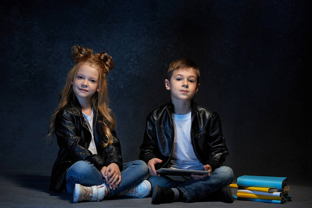 Studio shot of two children with laptop - Foto, Imagem