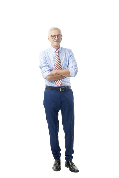 Full length shot of a confident senior businessman wearing shirt and tie, isolated on white - Foto, immagini