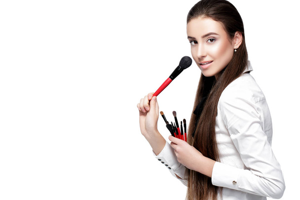 make-up artist holding makeup brush - Foto, imagen