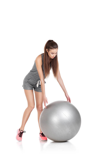 woman in sports clothes with fitness ball - Foto, imagen