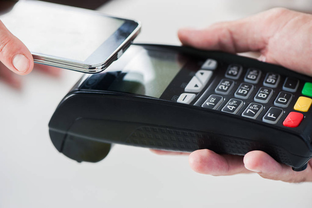 NFC Payment. Мобильная платежная система Near Field
 - Фото, изображение