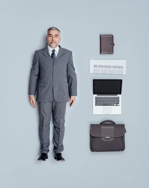 Realistic corporate business executive doll with work tools, flat lay - Fotoğraf, Görsel