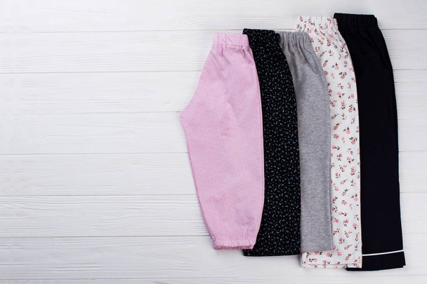 Pile of girls pants - Foto, Imagen