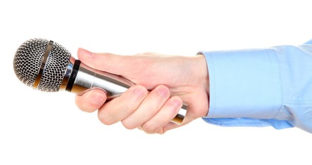 Male hand with microphone isolated on white - Valokuva, kuva