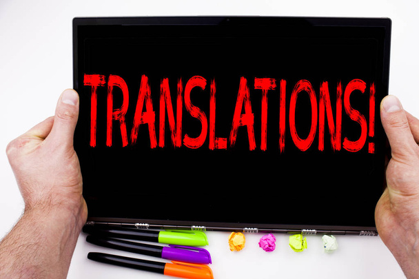 Translations text written on tablet, computer in the office with marker, pen, stationery. Business concept for  Translate Explain Plead Book Language white background with copy space - Photo, Image