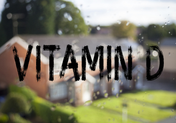 Texto de anuncio título que muestra la vitamina D. Concepto de negocio para suplementos alimenticios minerales Nutrimento escrito en el fondo de ladrillo viejo con espacio de copia
 - Foto, imagen