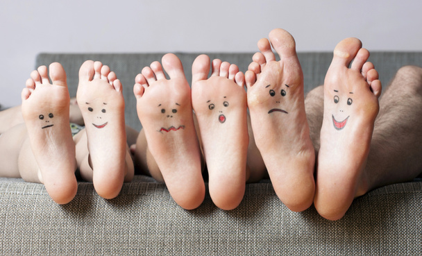 Close up of human soles with smiles - Photo, Image