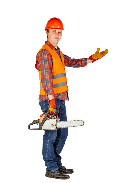 Full length portrait of a male lumberjack in a helmet  over whit - Foto, immagini