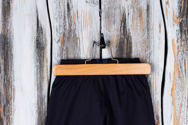 Pants on a wooden hanger - Photo, Image