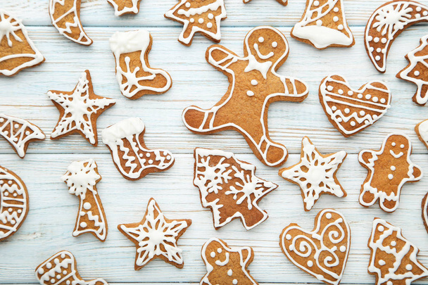 Christmas gingerbread cookies on white wooden table - Фото, зображення