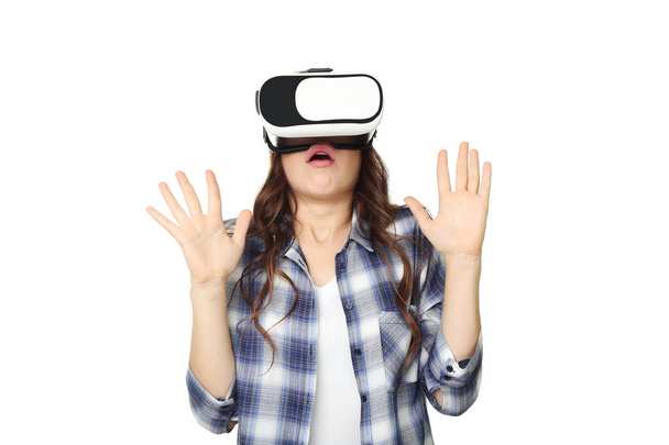 Young girl in virtual reality goggles on white background - Zdjęcie, obraz