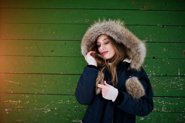 Beautiful brunette girl in winter warm clothing. Model on winter - Foto, Imagem