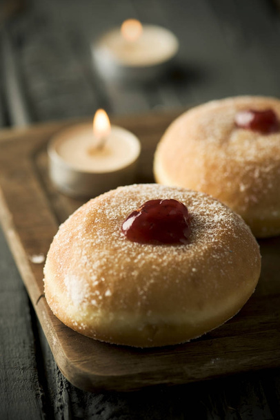 sufganiyot, Jewish donuts eaten on Hanukkah - 写真・画像