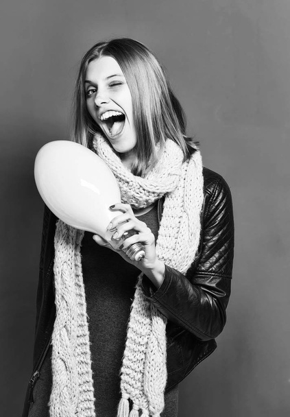 Happy pretty girl with bulb - Photo, Image